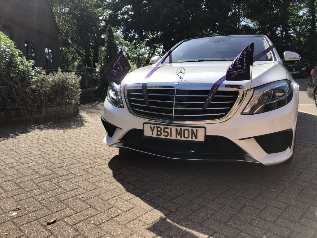 Wedding car ribbons and flags