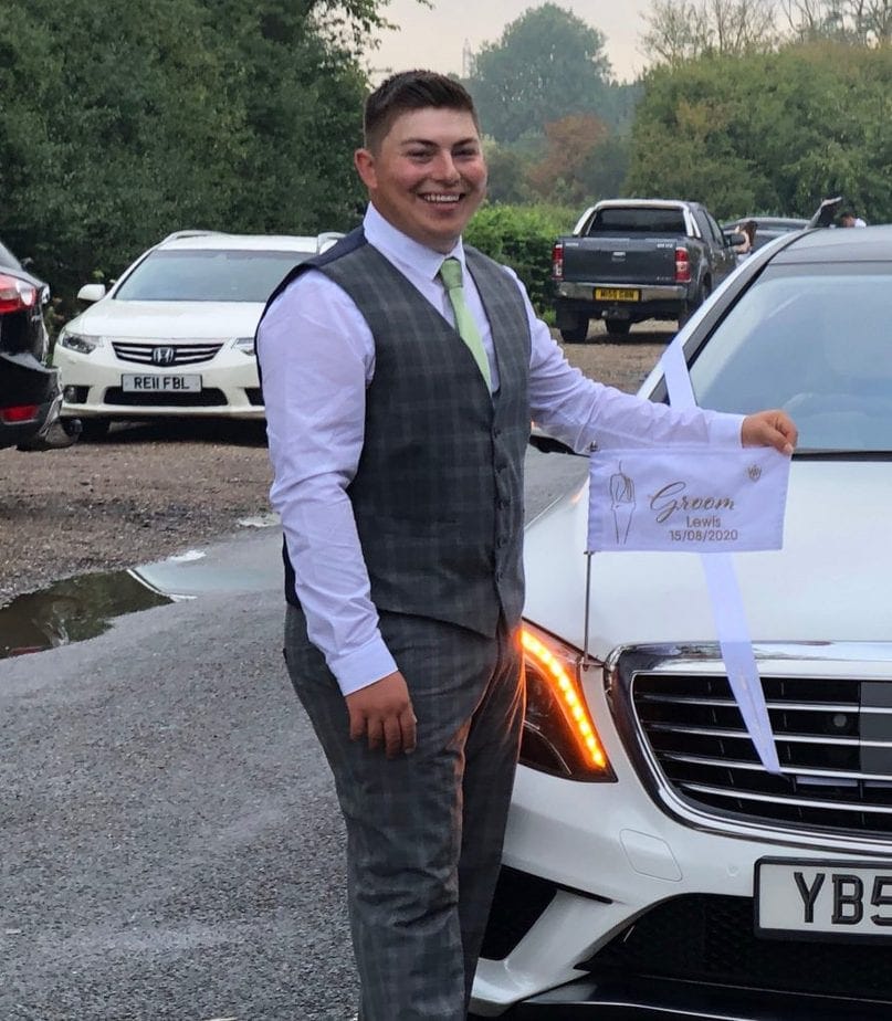 Grooms wedding car flags